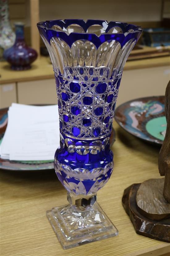 A large blue overlaid cut glass vase height 41cm